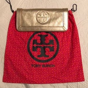 Tory Burch gold clutch